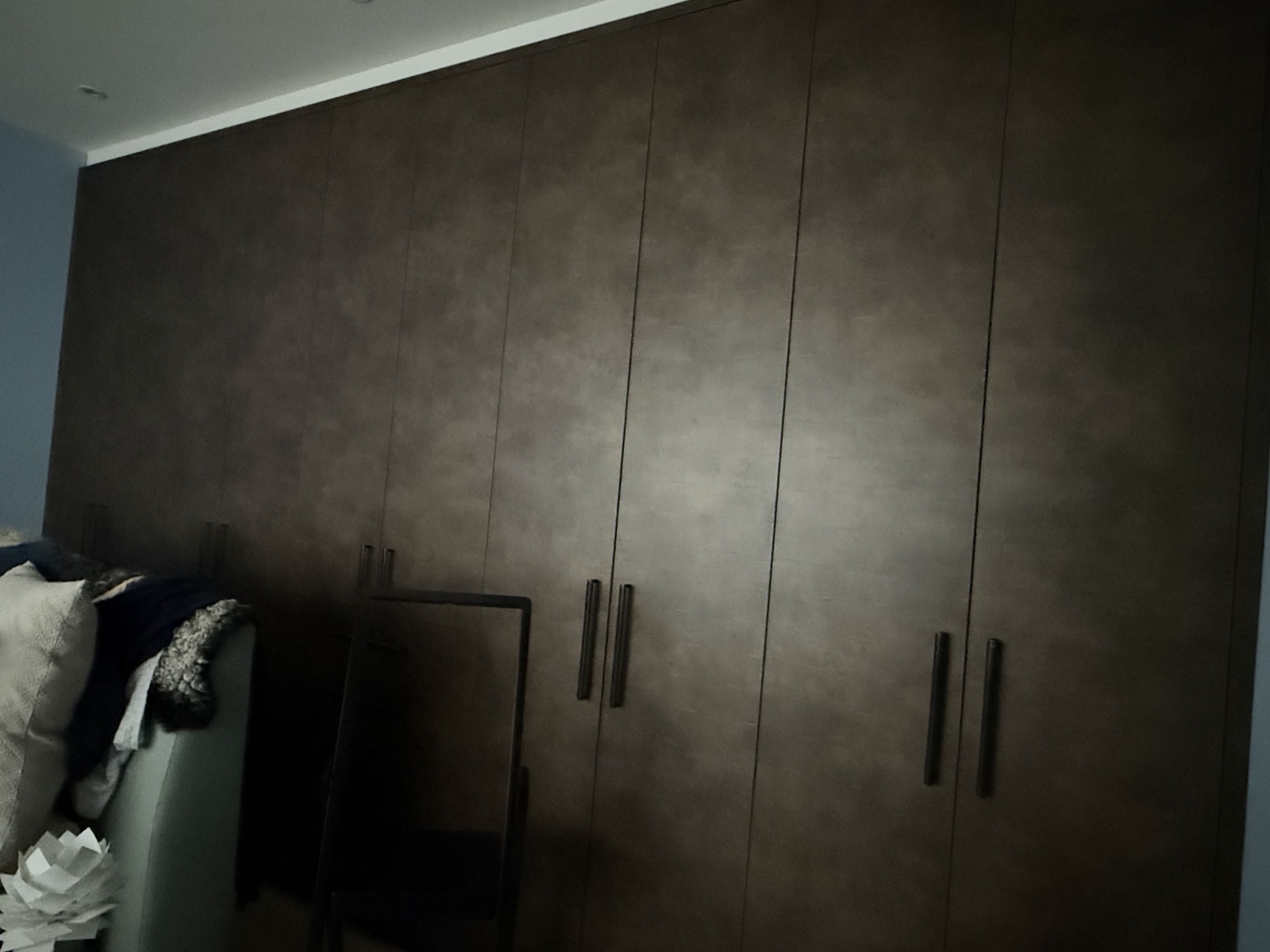 Full-width bespoke wardrobes in our bedroom